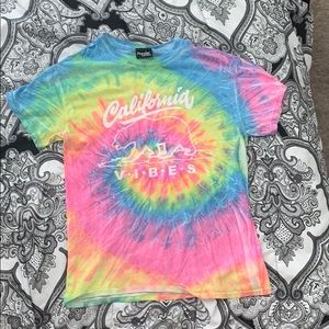 I am selling a tie dye shirt from rue21. (USED)